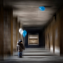 Child and balloons