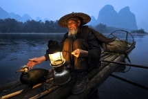 Pescador con cormorán